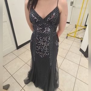 Navy blue embroidered prom dress.